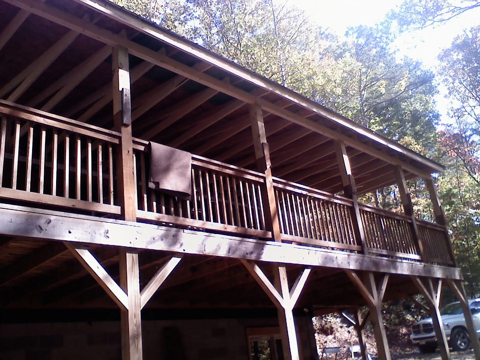 Timber framing under a new elevated porch and deck — Roof Leak Repair in Leoma by Roofing Brothers